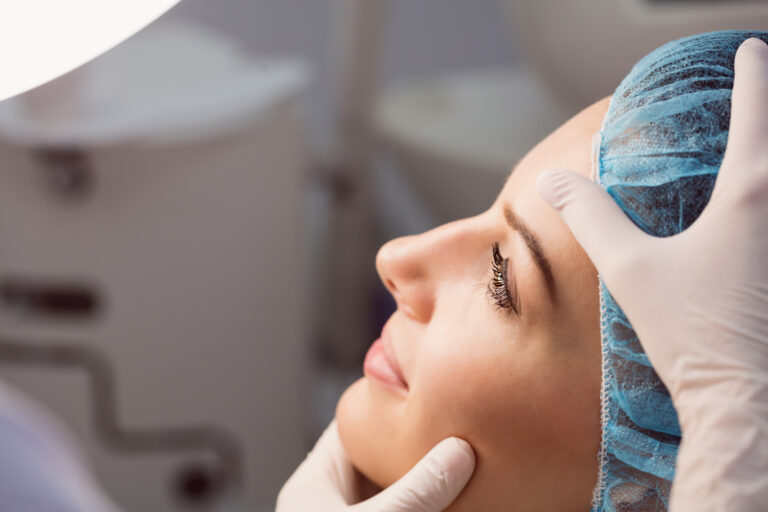 Woman receiving exam before dermal filler