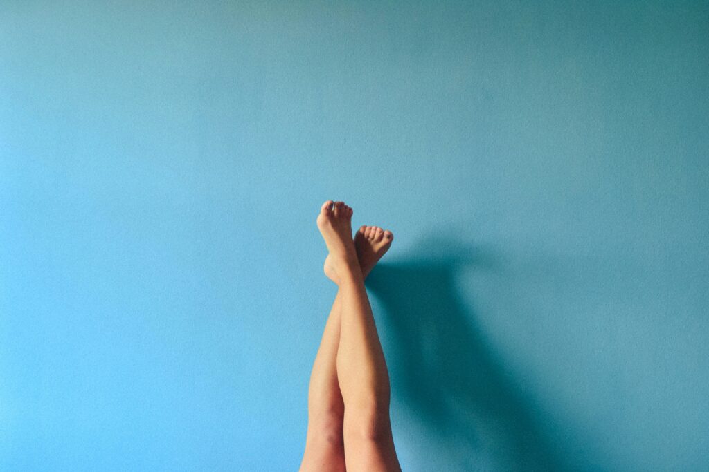 Legs in the air.