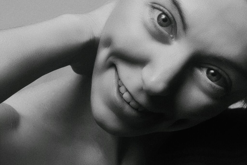 Woman smiling and looking ahead