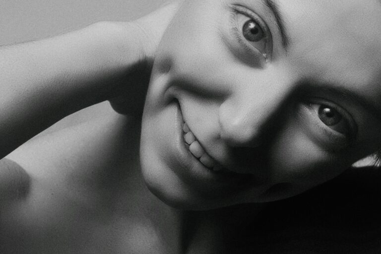Woman smiling and looking ahead