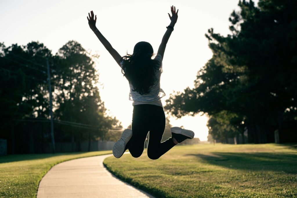 Woman jumping in air